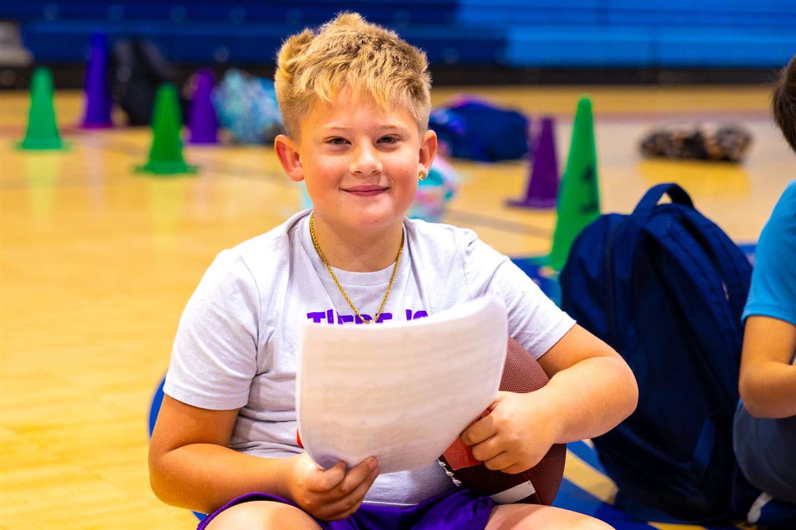 student with music sheet